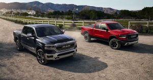 A pair of 2019 RAM 1500 trucks on a ranch