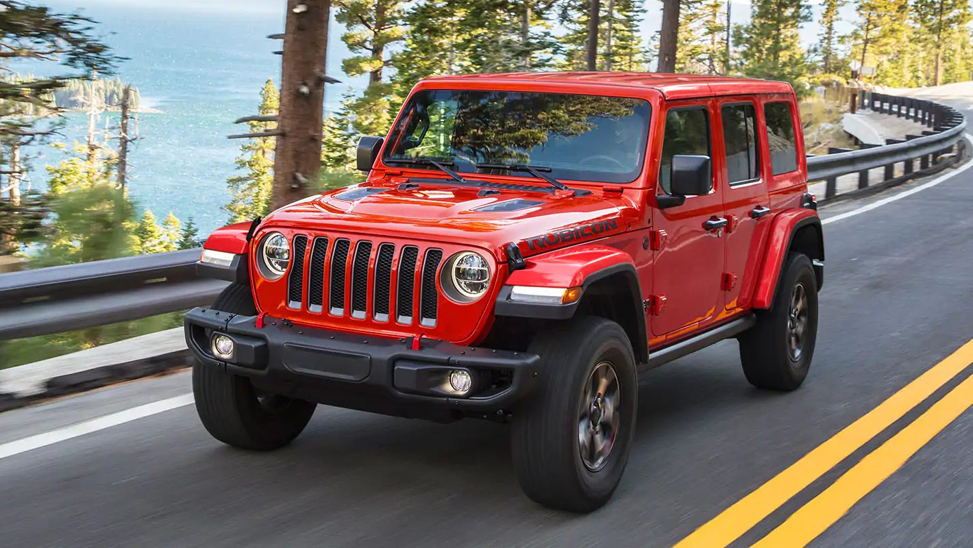 A Jeep Wrangler driving on the road